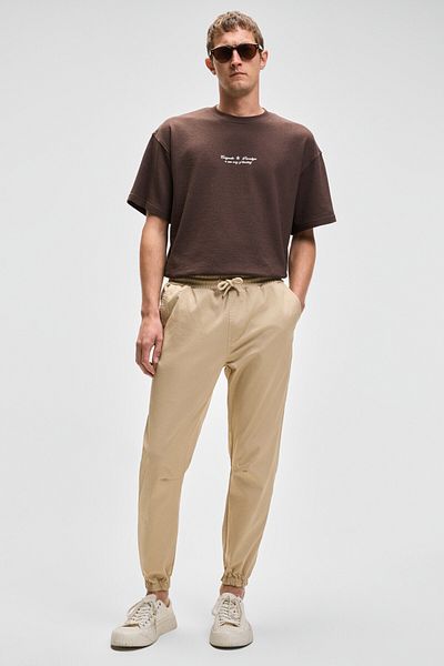GRIMELANGE Jakob Men's Woven Washed 4-Pocket Thick Textured Beige Trousers with Elastic Legs