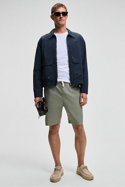 GRIMELANGE Lasper men's Stretch Fabric sides pockets elastic waist Relaxed Fit light khaki shorts
