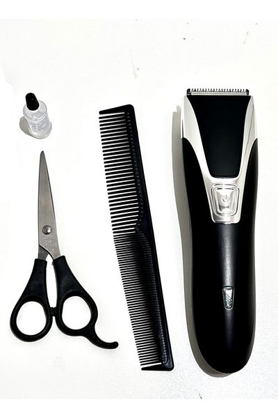 Cady One waterproof hair clipper 600mAh battery. with scissors, a comb, and two adjustable shaving heads
