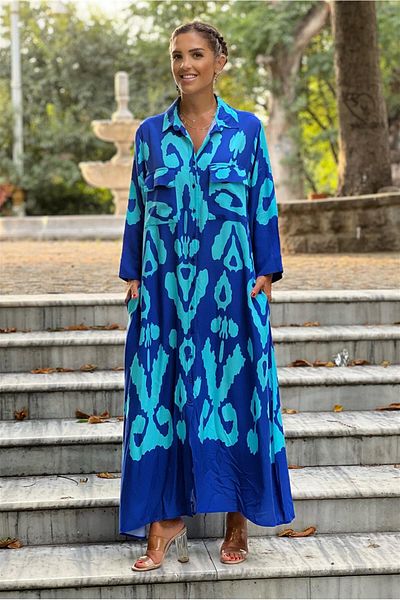 Nevin Kaya Moda Τυρκουάζ φόρεμα με σχέδιο Alice