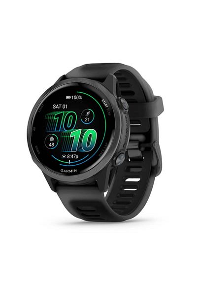Garmin Forerunner 570 GPS running watch, charge/data cable, documentation