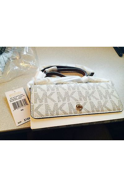 Michael Kors Wallet on a Chain crossbody bag, light cream color
