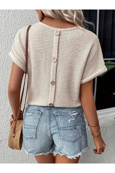Kokosh moda Γυναικεία κοντομάνικη μπλούζα με λαιμόκοψη V με λεπτομέρεια πλεκτή μπλούζα