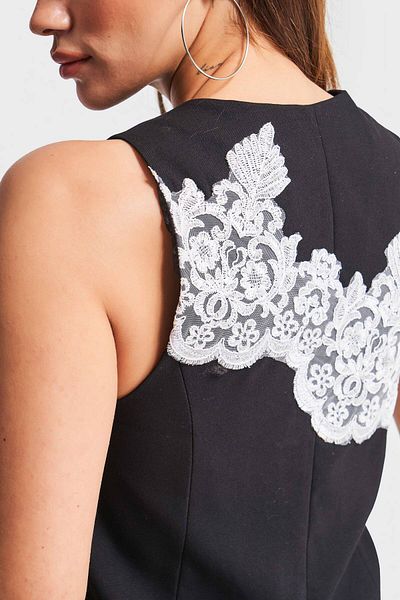 its basic Women's Black Color Lace Embroidered Zero Sleeve Button Design Fabric Vest