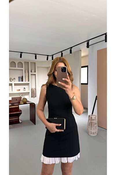 Sezgi Tekin Чорна сукня зі складками на подолі