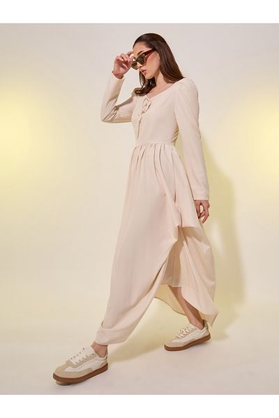 Styli Solid Puff Sleeves Asymmetric Hem A-Line Maxi Dress