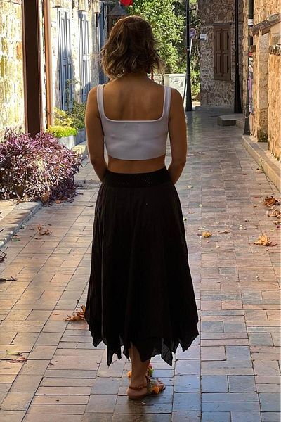 Nevin Kaya Moda Μαύρη ασύμμετρη φούστα με επένδυση από 100% βαμβάκι