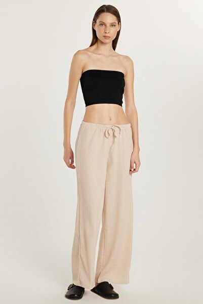 Tudors Kadın Slim Fit Gofre Raşel Beli Bağcıklı Geniş Paça Bej Pantolon