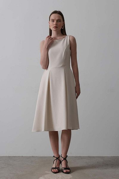 Melike Bakar Boutique Sleeveless Midi Dress with Pocket Detail