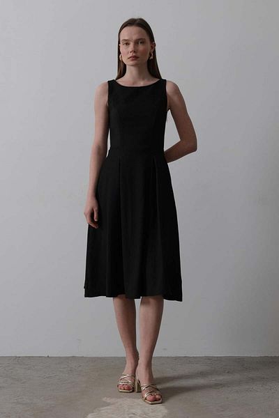 Melike Bakar Boutique Sleeveless Midi Dress with Pocket Detail