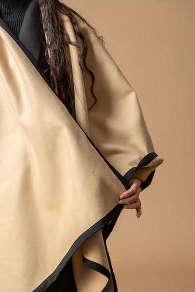 outline Camel shawl with black braids