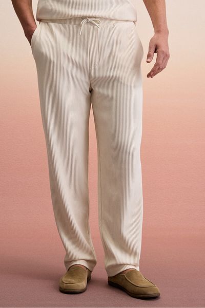 GRIMELANGE Erno men's relaxed cream trousers with elastic waist and side pockets