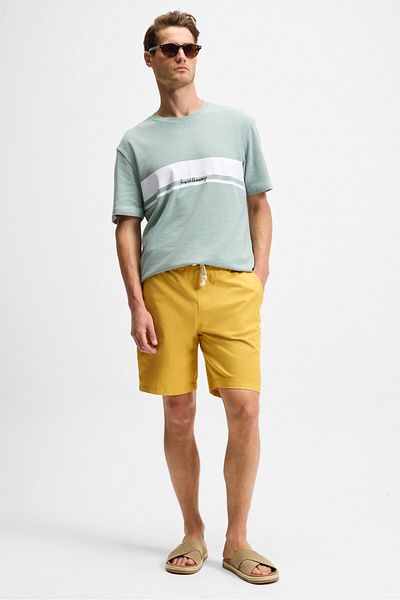 GRIMELANGE Lasper men's Stretch Fabric side pockets elastic waist Relaxed Fit saffron yellow shorts