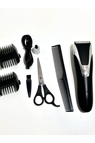 Cady One waterproof hair clipper 600mAh battery. with scissors, a comb, and two adjustable shaving heads