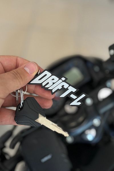 Banxtre White Color Keychain for Mondial Drift-L (1 Pc)