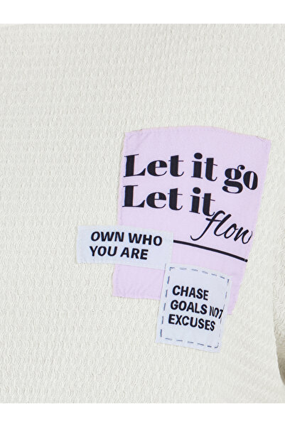 Styli Plus Size Textured Oversized T-Shirtâ€‹ with Patch Detail