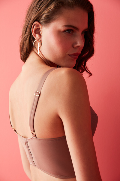 Penti Μπεζ δερμάτινο μπουστάκι με λουράκια και αλυσίδα