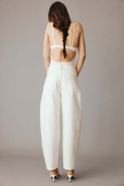 H&M بنطال جينز طويل بقصة برميل