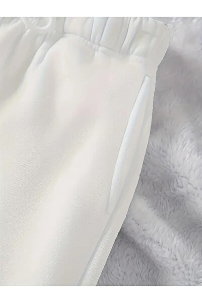 Touz Moda Унісекс білі спортивні штани з еластичним низом і принтом Butterfly Line