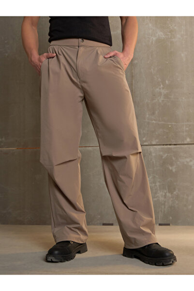 Sassafras By Styli Solid Front Pleated Baggy Parachute Pants