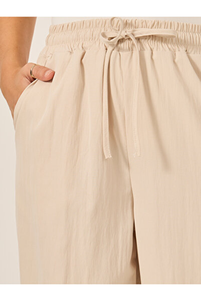 Styli Plain Drawstring Waist Wide Leg Pants