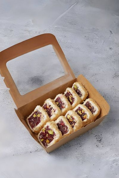 Lutfuzade Baklava Turkish delight with milk and pomegranate topped with kunafa - Lutfi Zadeh Baklava