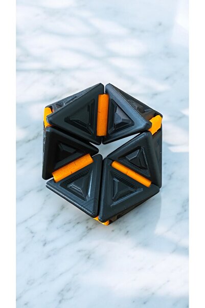 craftlab لعبة الضغط المثلثة الدوارة باللون الأسود والبرتقالي 7.5 سم