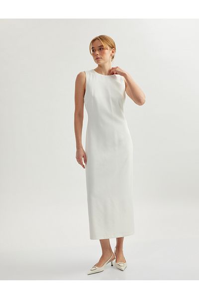 Koton Sleeveless crew neck midi pencil dress.