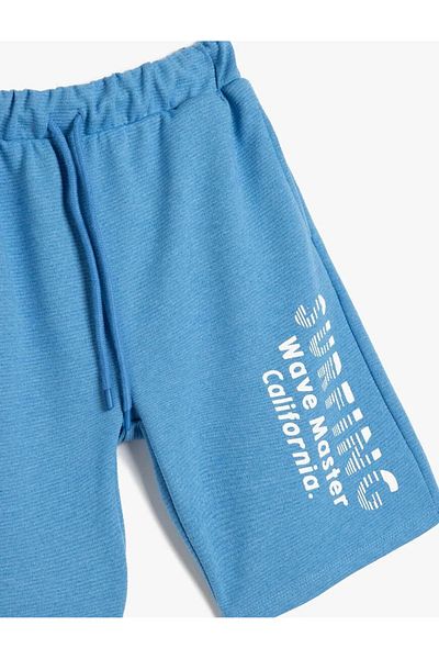 Koton Pantaloni scurți cu imprimeu slogan Pantaloni scurți albaștri pentru băieți cu detaliu de buzunar cu talie 5SKB40028TK
