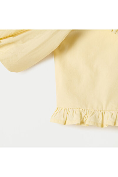 Juniors A-Line Top With Peter Pan Collar And Ruffle Detail