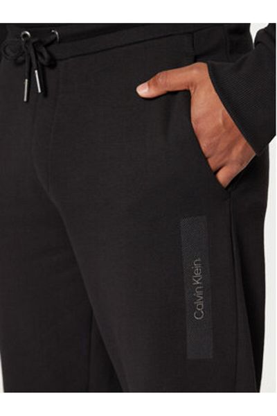 Calvin Klein Pantaloni de trening Calvin Klein pentru bărbați K10K113838 Negri