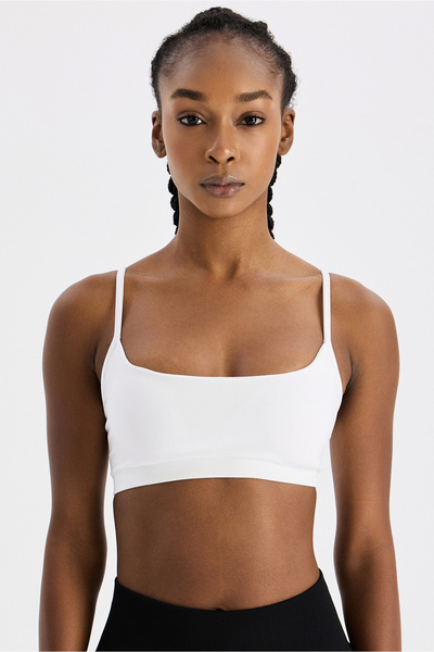 COMEUP Αθλητικό σουτιέν με ρυθμιζόμενο λουράκι και επένδυση σε λευκό χρώμα