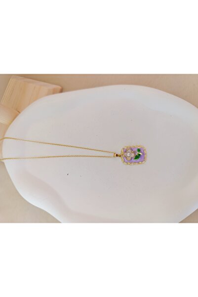 karan jewel قلادة من الفولاذ الأرجواني مع زهرة المينا من Pinterest