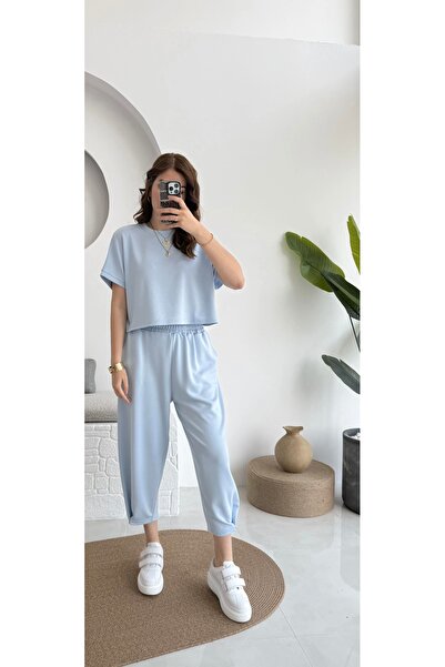 manana fashion طقم بنطال شالوار مشروط برقبة دائرية باللون الأزرق الفاتح