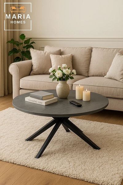 MARIA HOMES Grey stone round coffee table with angled black metal legs