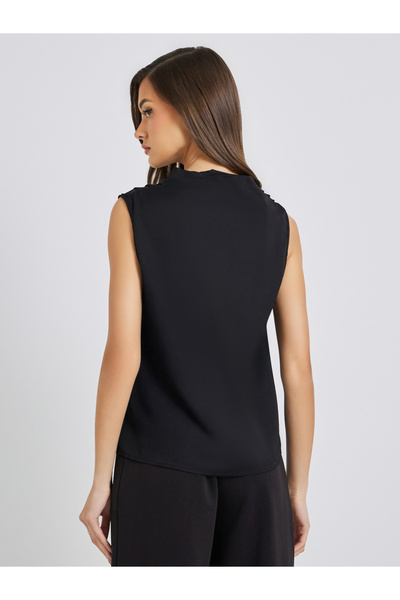 Take Two By Styli Solid Button Front Sleeveless Blouse