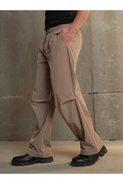 Sassafras By Styli Solid Front Pleated Baggy Parachute Pants