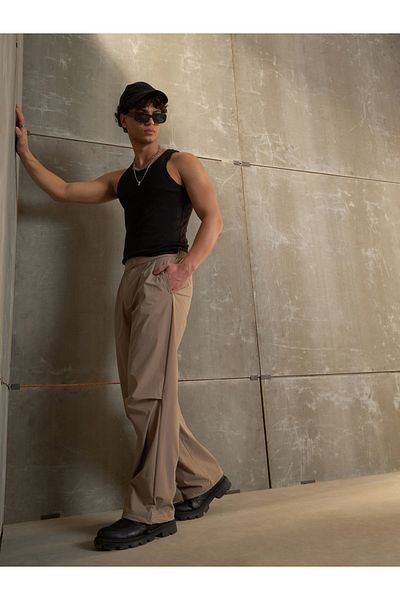 Sassafras By Styli Solid Front Pleated Baggy Parachute Pants