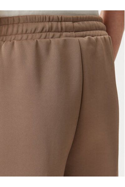 Puma Pantaloni de trening pentru femei 629797 Maro