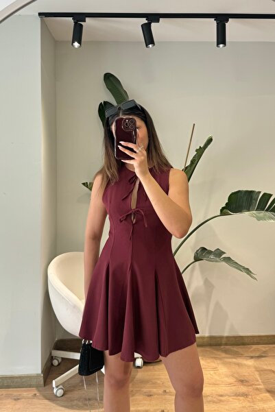 Güneş Μίνι φόρεμα Cles Couture με λεπτομέρεια με κόμπο