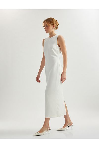 Koton Sleeveless crew neck midi pencil dress.