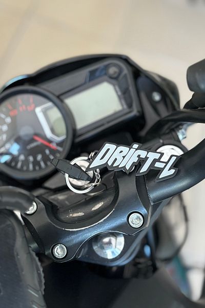 Banxtre White Color Keychain for Mondial Drift-L (1 Pc)