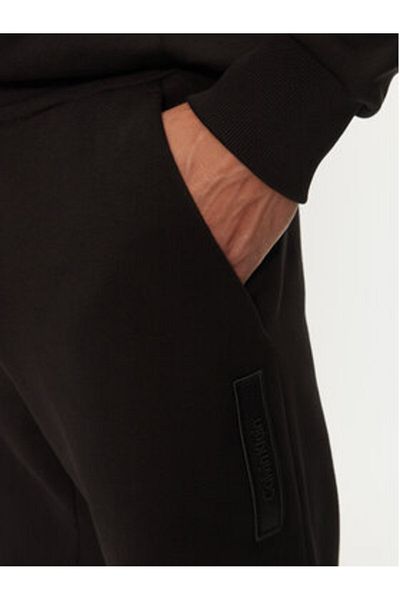 Calvin Klein Pantaloni de trening Calvin Klein pentru bărbați K10K113579 Negri
