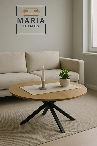 MARIA HOMES Large walnut round coffee table with cross metal base