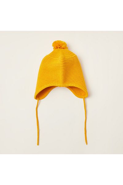 giggles Juniors Textured Cap With Pom-Pom Detail And Tie-Ups