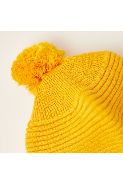 giggles Juniors Textured Cap With Pom-Pom Detail And Tie-Ups