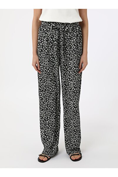 Benin Штани з візерунком квітів - чорні/білі - Benin