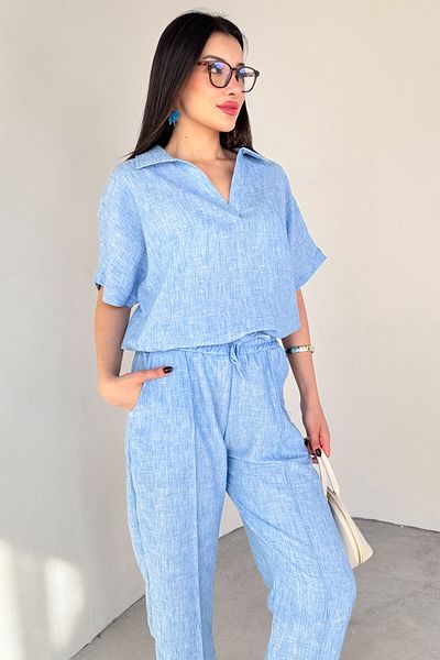 Cappmoda TKM-13309 تي شيرت أزرق كبير الحجم بياقة بولو وبنطلون جزرة مزين بتفاصيل ربط، طقم مكون من قطعتين