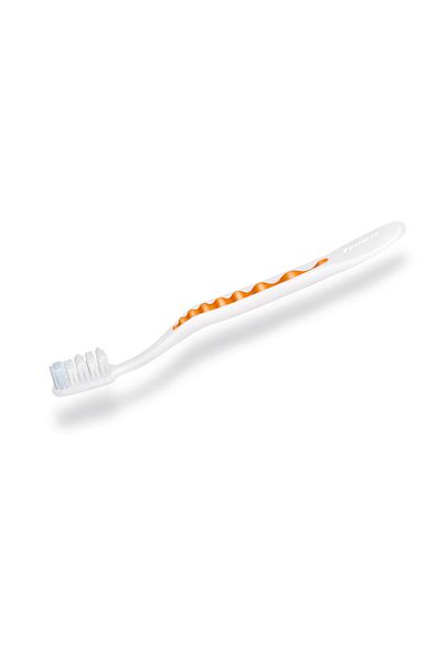 Trisa Pearl White Medium Manual Toothbrush 627186 Orange