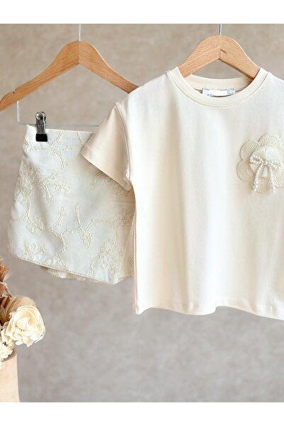 Alvadonna Girl's suit with shorts and skirt